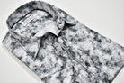 Enhance your contemporary style with the Marcello Slate Paisley. Featuring a unique mix of slate, gray and charcoal tones, and floating white paisleys, this abstract print offers a cool and modern aesthetic.