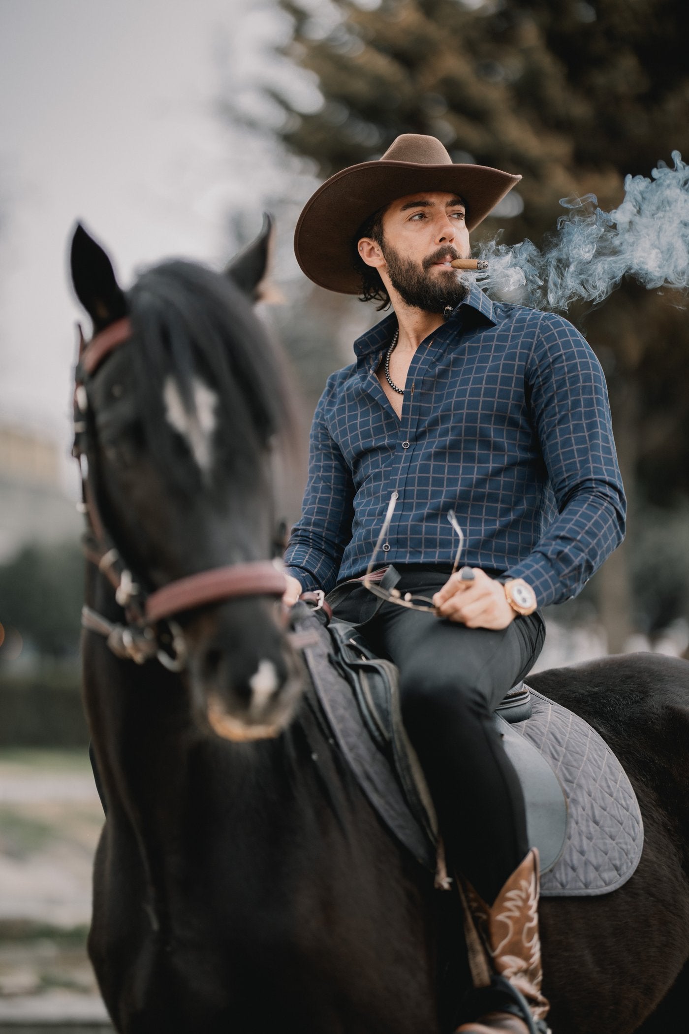 Elevate your style with the Marcello Navy West Clip. The rich navy color and camel window pane pattern add a touch of sophistication to this classic yet contemporary accessory. Perfect if your look is updated traditional, fashion or even Western.