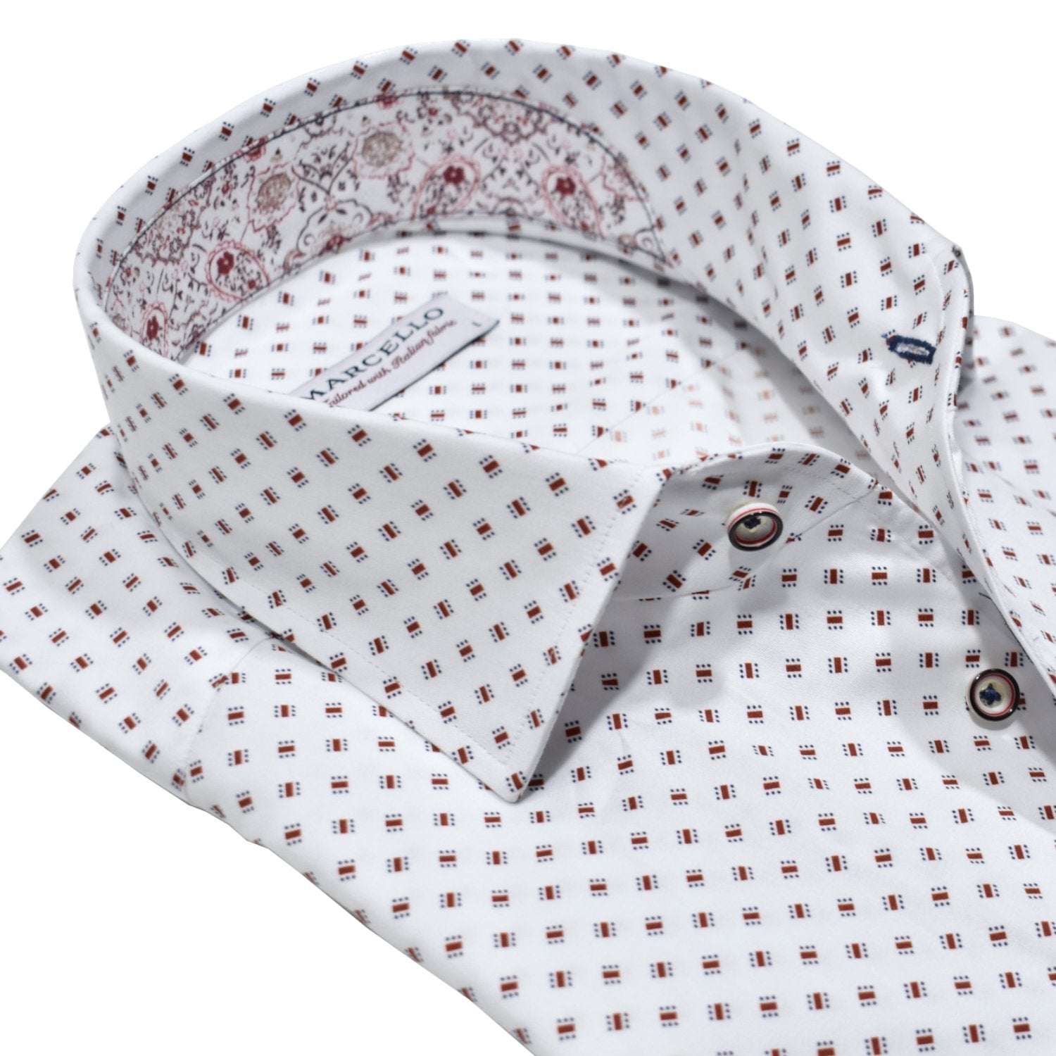 Experience the luxurious feel of crisp white cotton sateen with a stunning abstract red emblem pattern. Shirt by Marcello