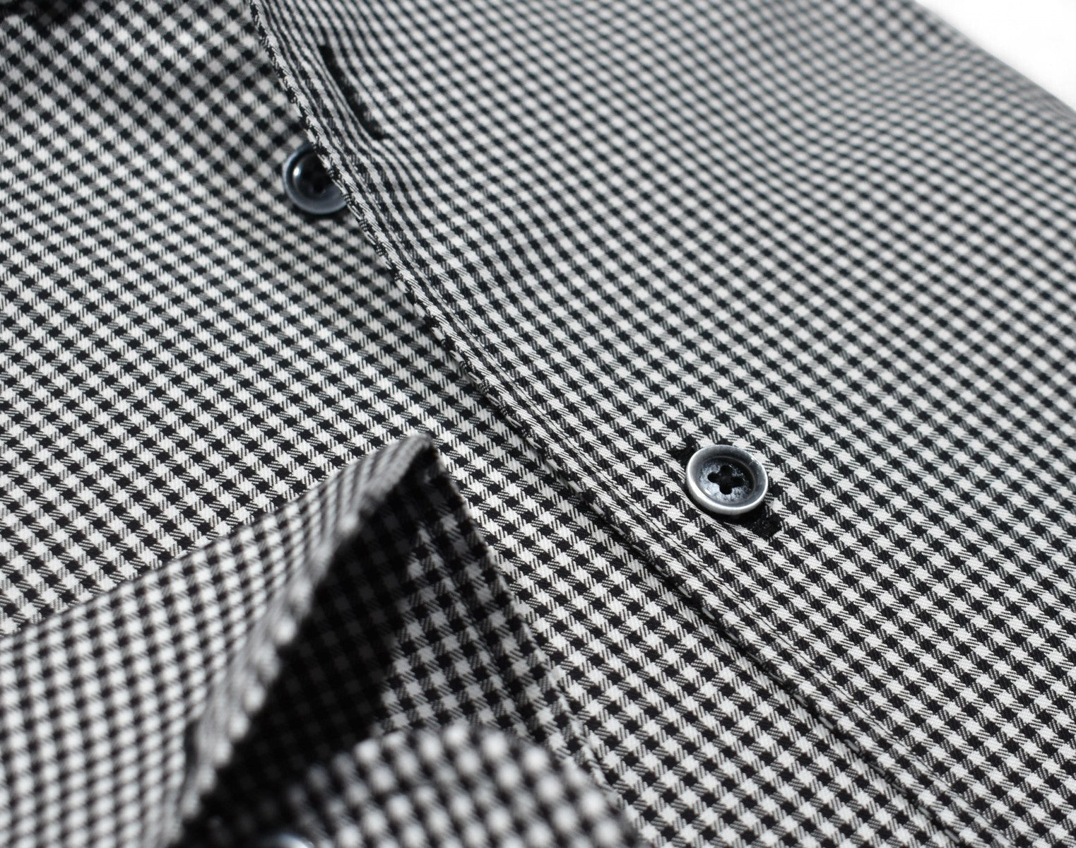 Elevate your style with the Marcello Black Textured Check Roll Collar.