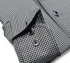 Elevate your style with the Marcello Black Textured Check Roll Collar.