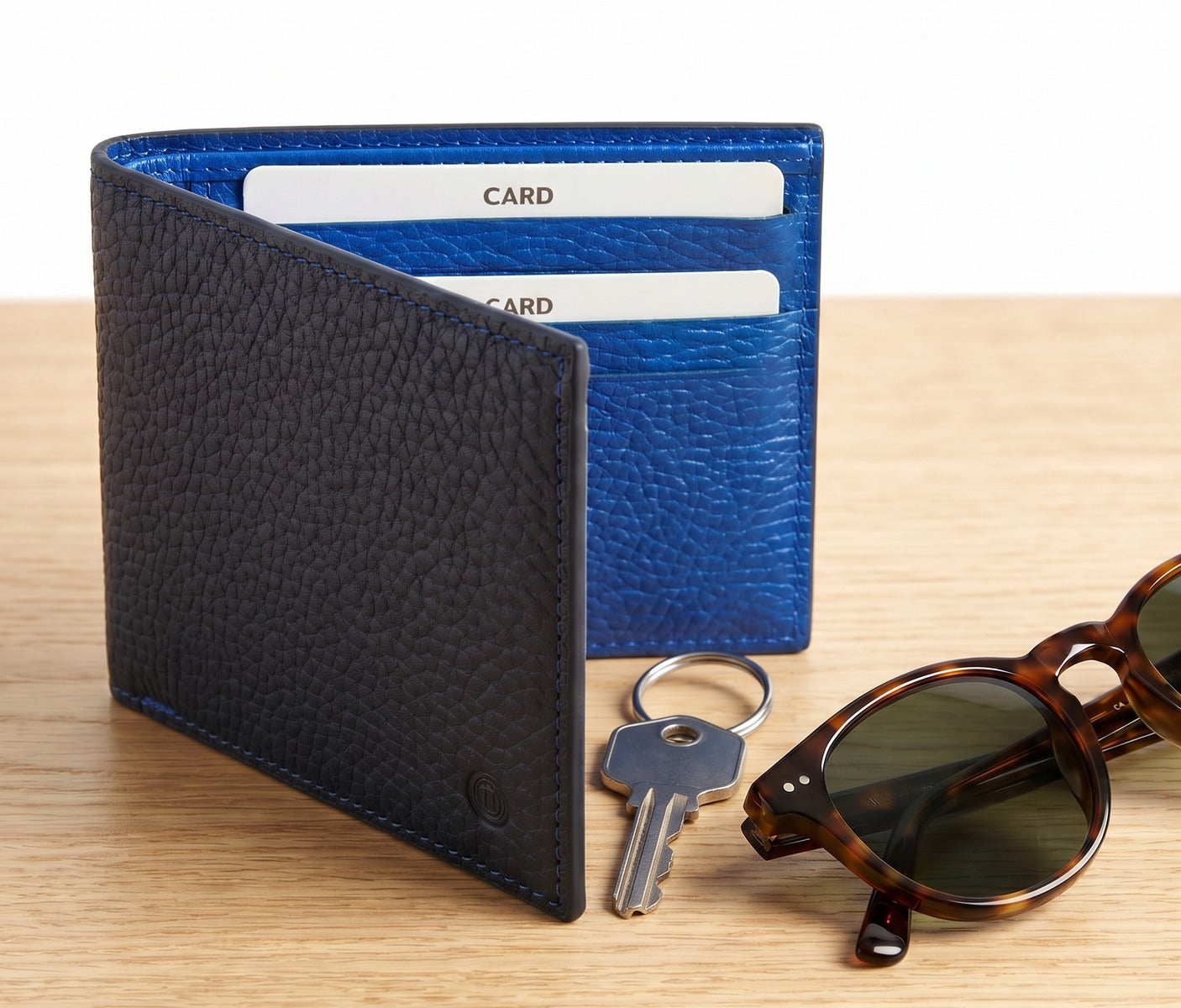 Marcello navy pebble leather billfold.