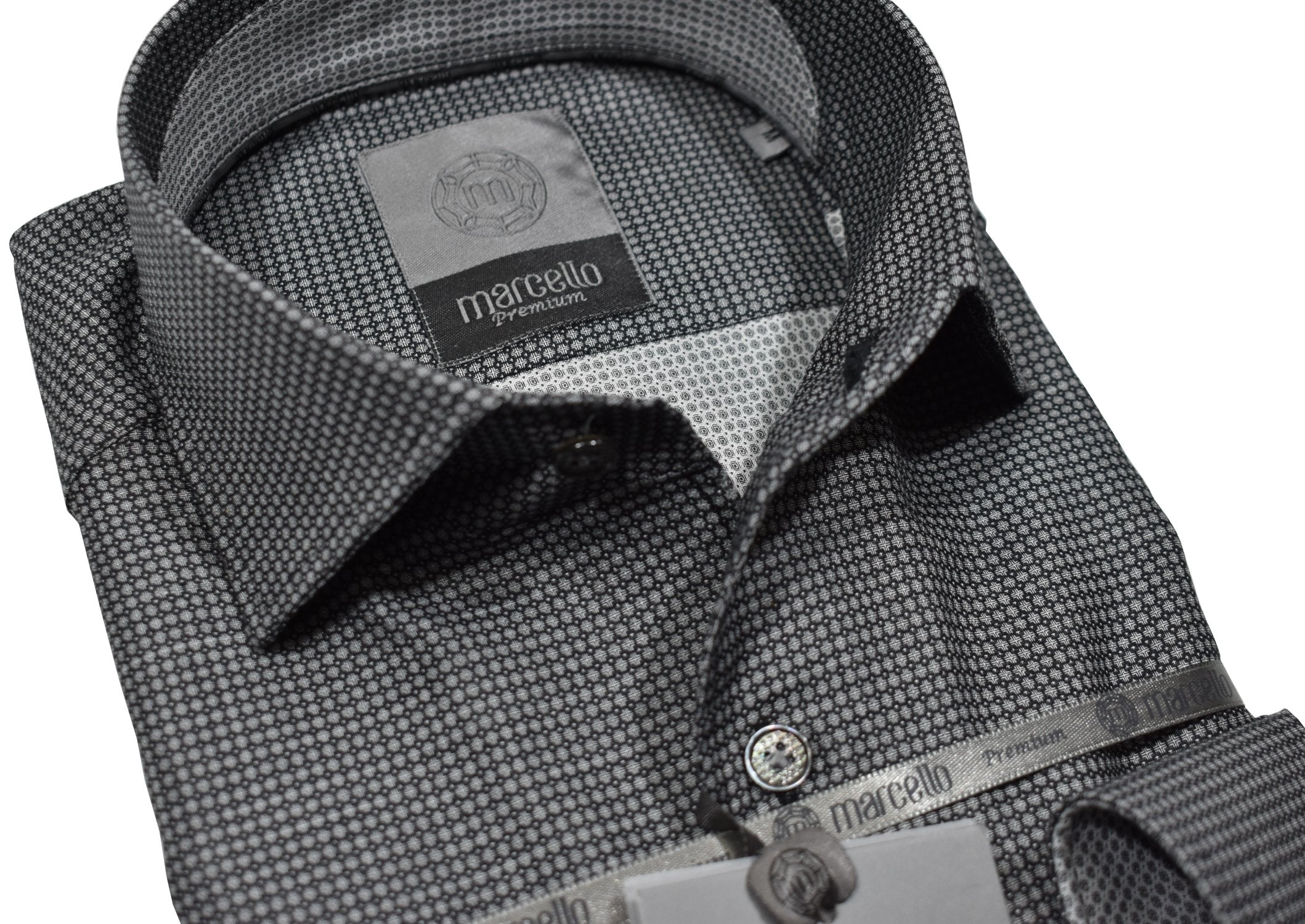 Elevate your wardrobe with the Marcello Premium Slate Hash Tag shirt. Crafted from extra fine fabrics sourced from fine Italian mills, our Marcello Premium program offers 100's 2 ply shirts in rich classic patterns. With the Marcello exclusive one piece roll collar, you'll feel confident and stylish in any setting.