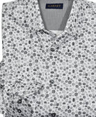 Transform your wardrobe with the dynamic ZA1038 Celestial Matter shirt. Featuring an eye-catching geometric print and an elegant blend of white, gray, charcoal and black, this shirt adds a touch of distinction to any outfit. Crafted from luxurious soft cotton, with a medium collar and classic shaped fit, this stylish piece will take you from day to night in effortless style.