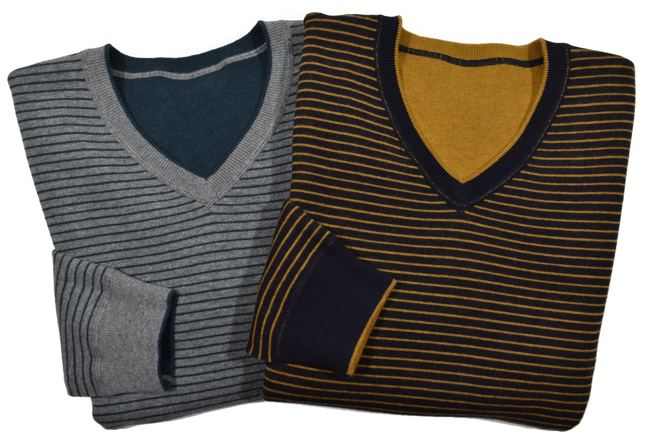 Experience versatility and style with a Cotton Cashmere Reversible sweater. Made with a  luxurious cotton and cashmere blend, this v neck sweater features solid color on one side and classic stripes on the reverse. Detailed with welted seam stitching for a modern touch. Stay cool and fashionable in any setting.
