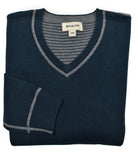 Experience versatility and style with a Cotton Cashmere Reversible sweater. Made with a  luxurious cotton and cashmere blend, this v neck sweater features solid color on one side and classic stripes on the reverse. Detailed with welted seam stitching for a modern touch. Stay cool and fashionable in any setting.
