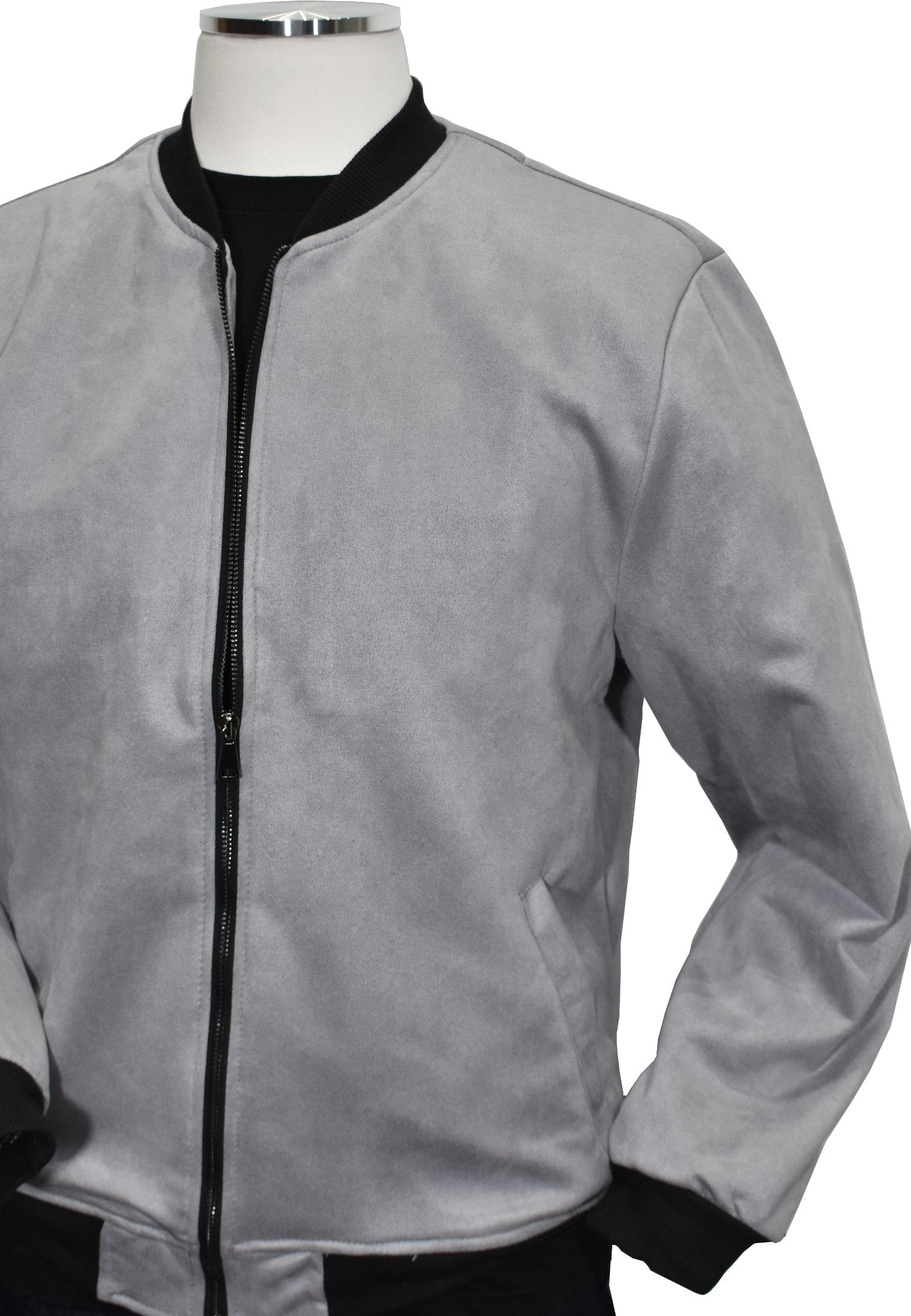 Elevate your style with the ZGK2021 Ultra Suede Bomber. Crafted from Italian ultra suede, this bomber features a classic banded cuff and waist band, as well as a sport stand up collar. Not only does it exude an elegant Italian fashion image, but it also offers timeless comfort and sophistication. By Marcello Sport.
