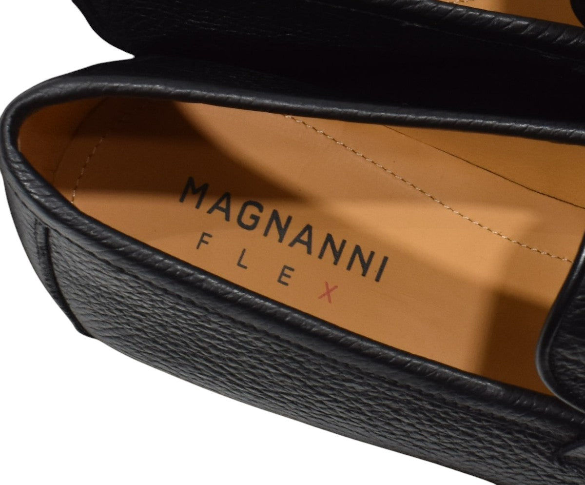 Rich Spanish leather in a pebble grain sporting a classic penny loafer model for the perfect anytime shoe.