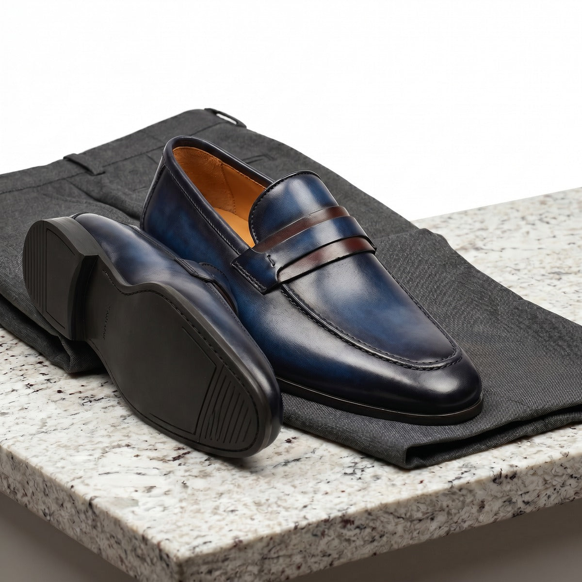 Magnanni navy brown flex shoe.