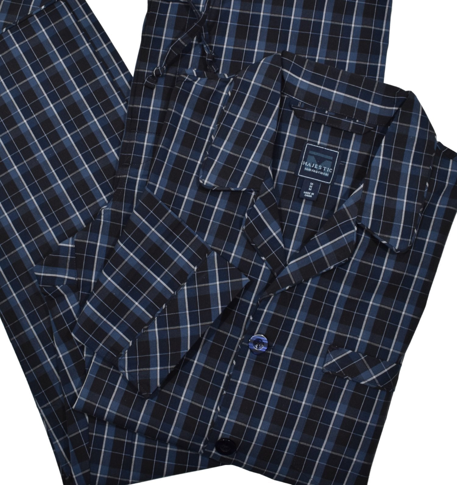 This Majestic exclusive navy blue plaid pajama set offers both style and comfort. Made with soft cotton, the classic button front top and drawstring pant provide ultimate coziness for lounging around the house. Upgrade your sleepwear game with these Atlantic Plaid Pajamas.
