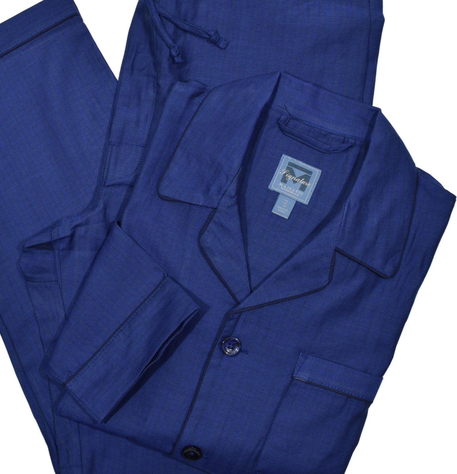 For the customer looking for luxury extended to the bedroom, we offer an 80’s 2-ply cotton pajama. The herringbone design provides subtle texture and elegance to a basic pajama. This pajama features a coat front top and breast pocket. Pant is 1/2 elastic back with drawstring front, 2 button fly and balloon seat. 100% cotton.