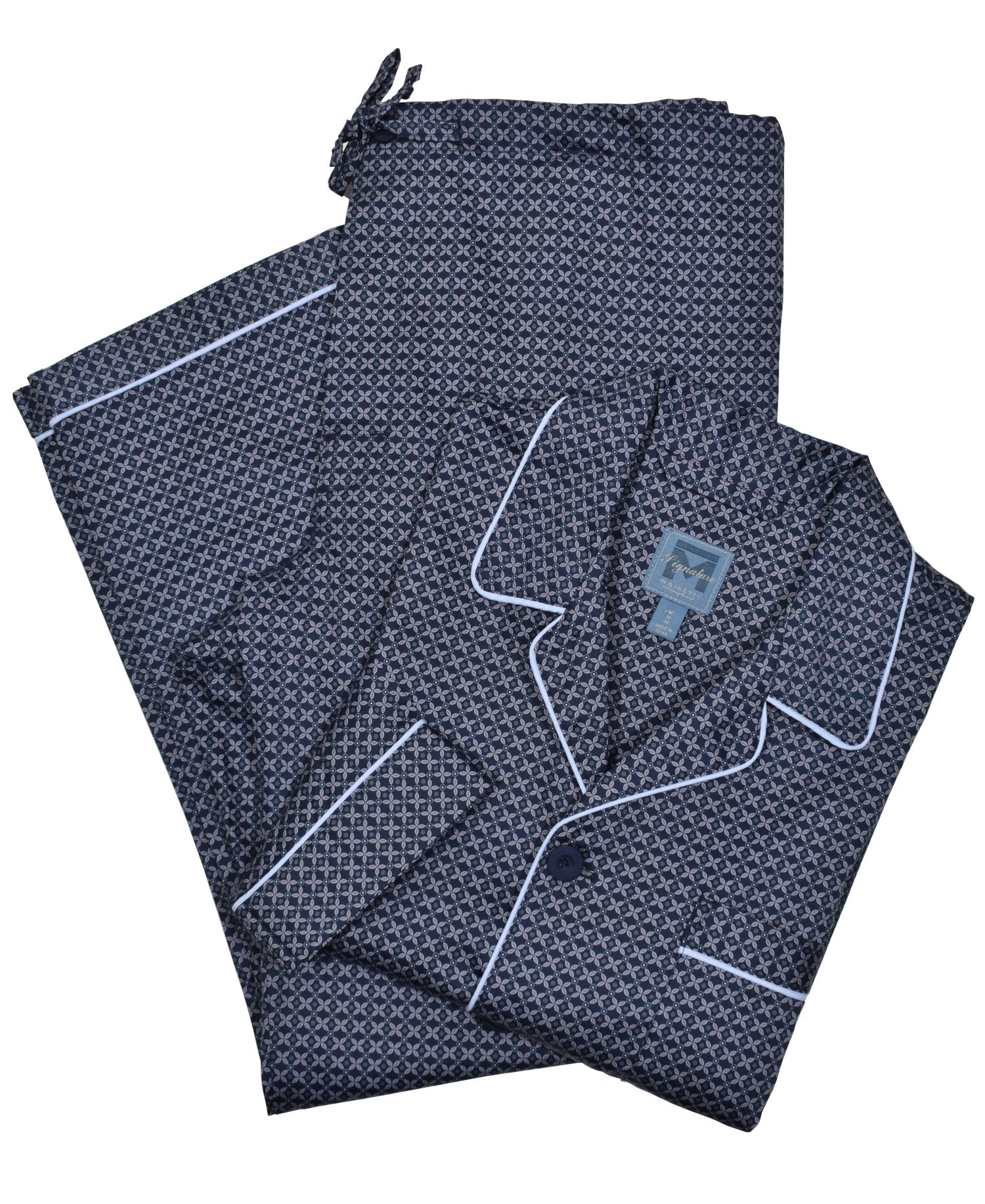 Feel cozy and relaxed in this classic navy flora pajama set. Crafted in soft cotton, this pajama is designed with a coat top with chest pocket and draw string bottoms with stretch waist for optimal comfort. Experience a luxurious night's sleep with the perfect combination of style and comfort.