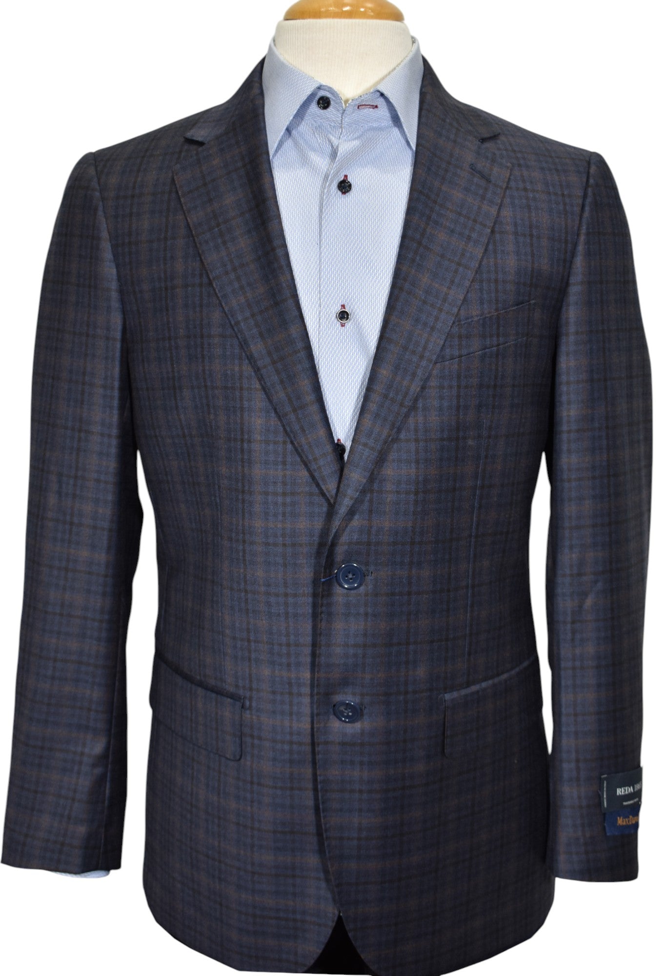 Max Davoli modern fit sport coat. Rich plaid mixing medium blue, gray with a windowpane in charcoal and camel.