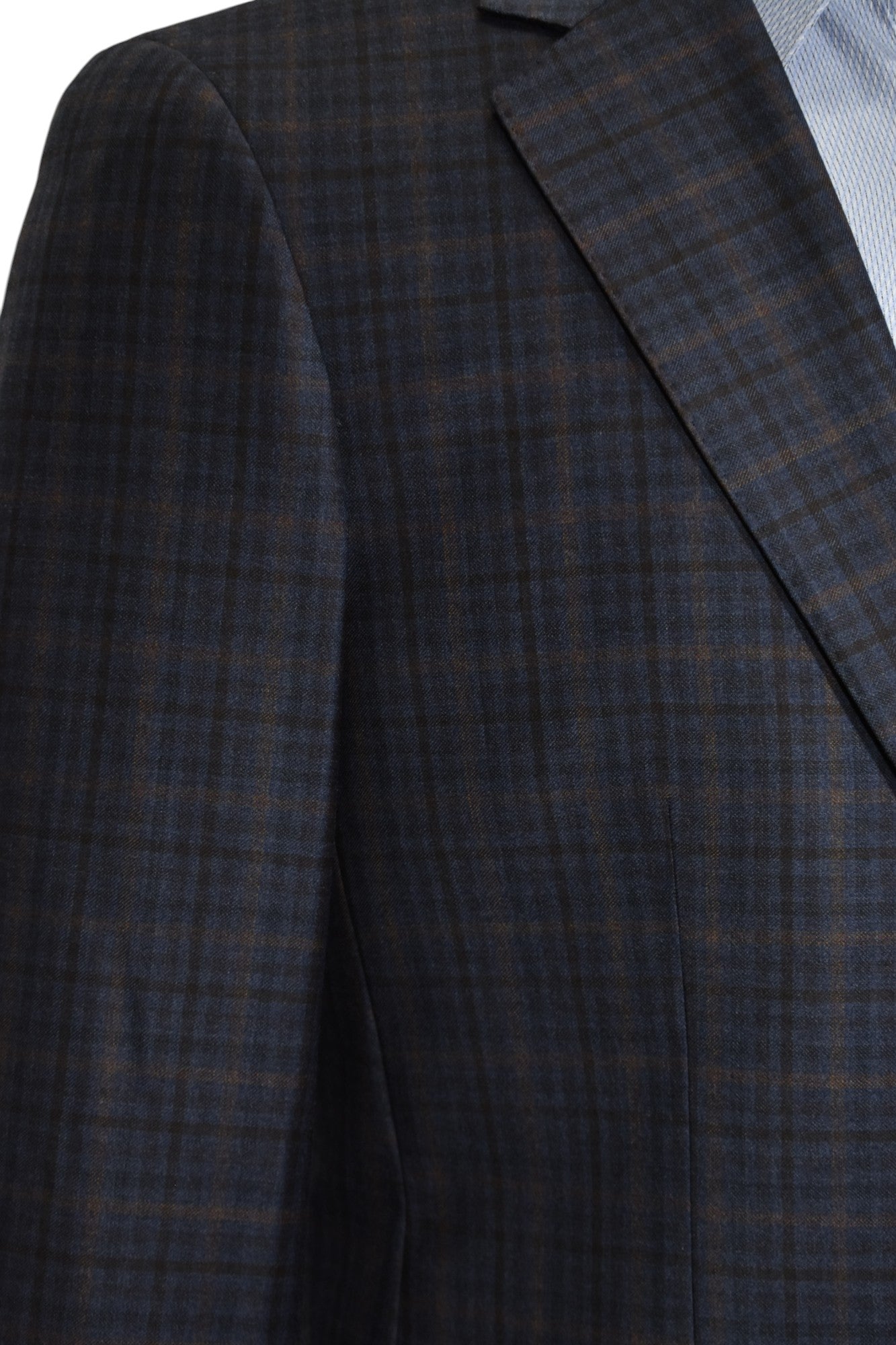 Max Davoli modern fit sport coat. Rich plaid mixing medium blue, gray with a windowpane in charcoal and camel.