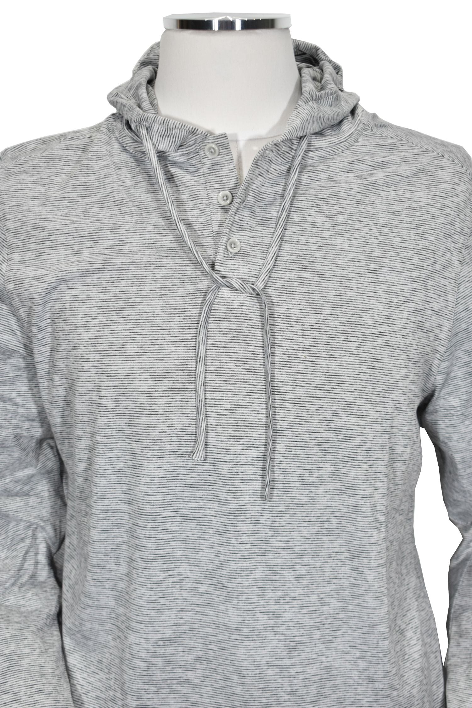 This classic fit feed stripe hoodie offers a contemporary style in a lightweight fabric with a soft, silky feel. The open sleeve and open bottom provide added mobility for all-day comfort. Available in gray or blue, it is the perfect hoodie for any occasion.  Classic fit.  Open sleeve and open bottom, super soft and a little heavier than a tee shirt.