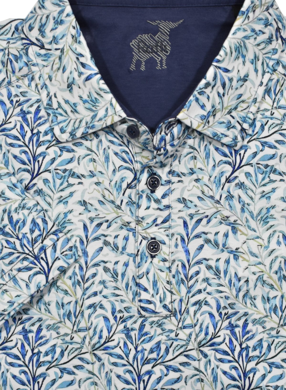 Experience ultimate comfort and style with the ZR24146 Raffi Indigo Floral Polo. Made with the sought after aqua cotton fabric, this polo is superb to the touch. The abstract print pattern in trend blue colors and self collar model add a modern and trendy touch. Upgrade your wardrobe with this must-have piece.
