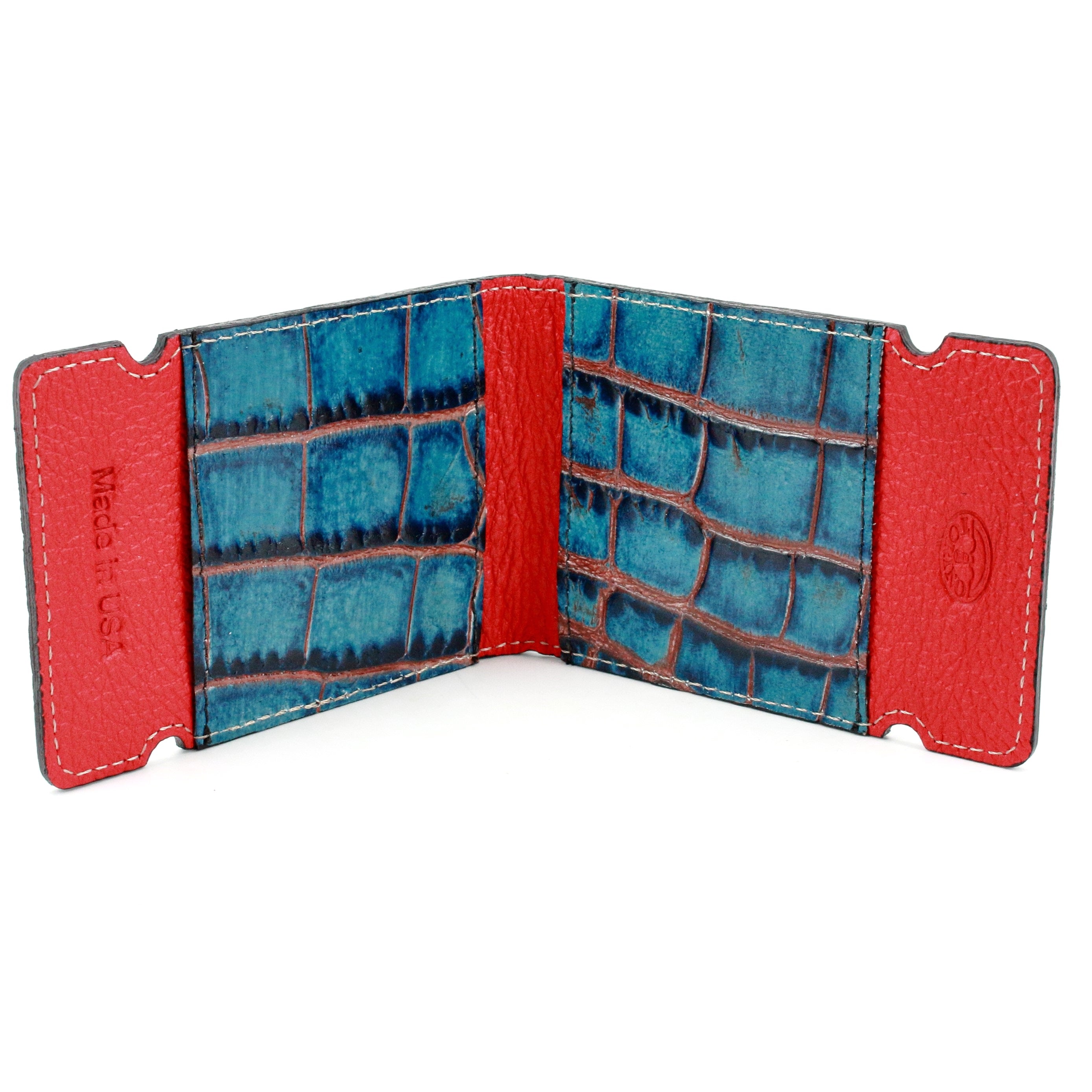 Elevate your game with the ZT52907W Indigo-Red Bill Fold. Crafted from luxurious crocodile embossed calf skin and lined with pebble grain leather, this wallet exudes a rich and sophisticated style. Perfect for those on the go, it offers practicality and high-end fashion in one sleek package.