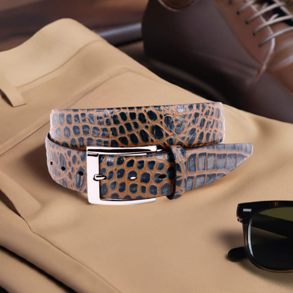 Crafted with impeccable attention to detail, the ZT52907 Italian Embossed Croc Slate with Mocha belt exudes sophistication and elegance. Crafted with soft Italian calf leather in a rich chocolate hue, it has been stained with a teal technique for an unforgettable statement tone. Statement silver buckle and a 35mm or 1 7/16" width is the final nuance of this timeless accessory, perfect with any cool jeans.