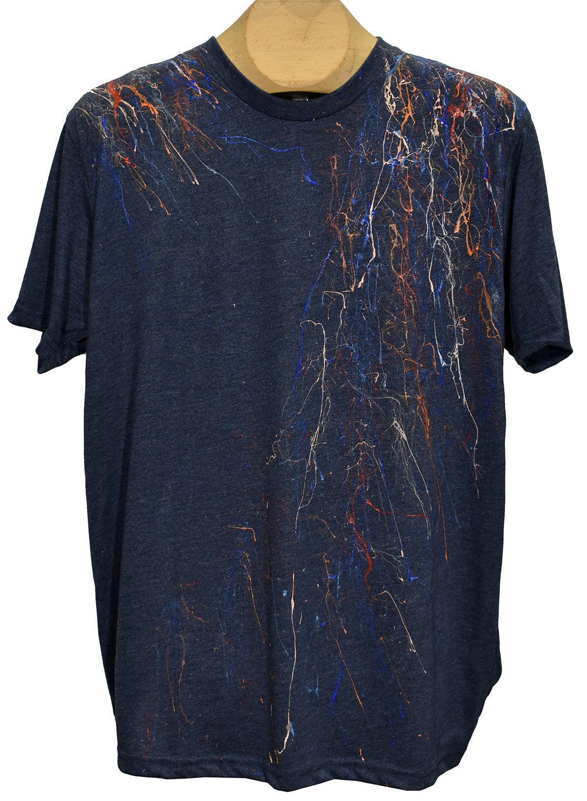 Tee shirts are not just tee shirts anymore. Our hand painted tees are individually painted by artists making each one a unique piece of art and making them stand out from other tee shirts in quality and style.  Elevate your casual fashion lifestyle with this hand painted indigo colored tee.
