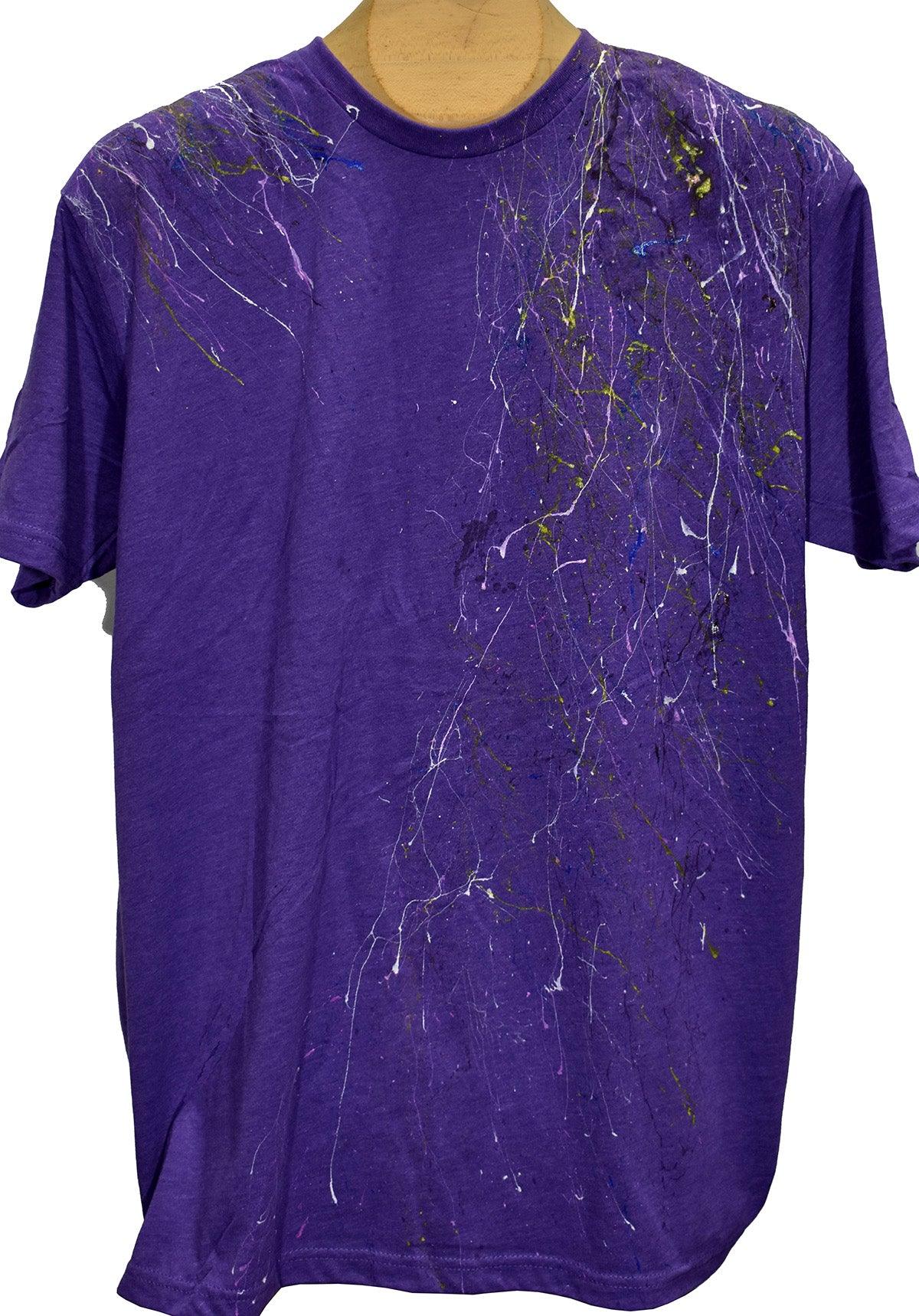Tee shirts are not just tee shirts anymore. Our hand painted Tees are individually painted by artists making each one a unique piece of art and making them stand out from other tee shirts in quality and style.   Fashion styling in a cool plum tee with our exclusive hand painted detailing.