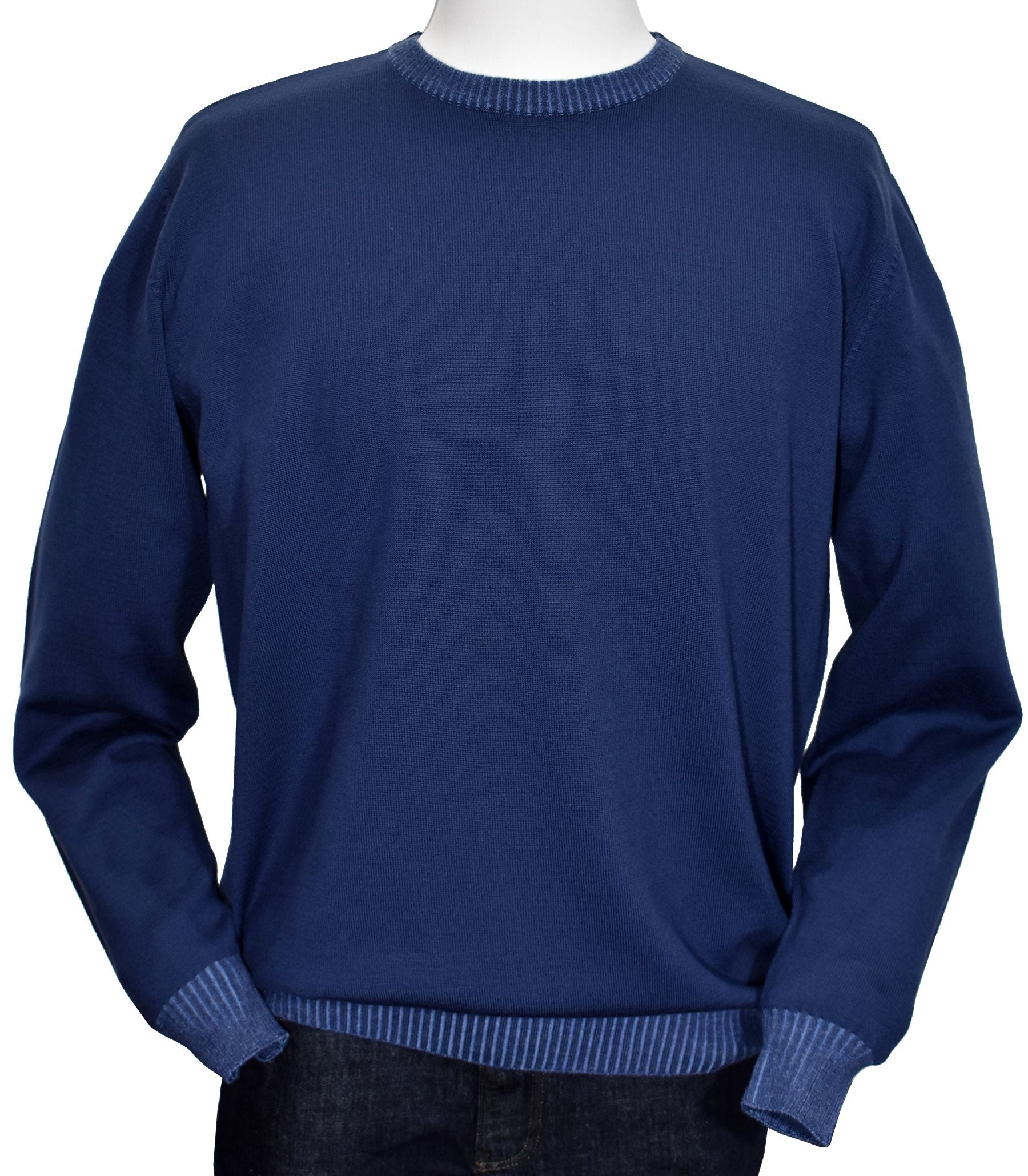 Soft, clean, classic with a touch of fashion best describes this Italian merino wool blended knit sweater.  The light weight and fine stitch work, coupled with accent edges, produces as style that works in any setting and year round.   Enhanced rib detailing with contrast shading.  Classic fit. By Marcello Sport.