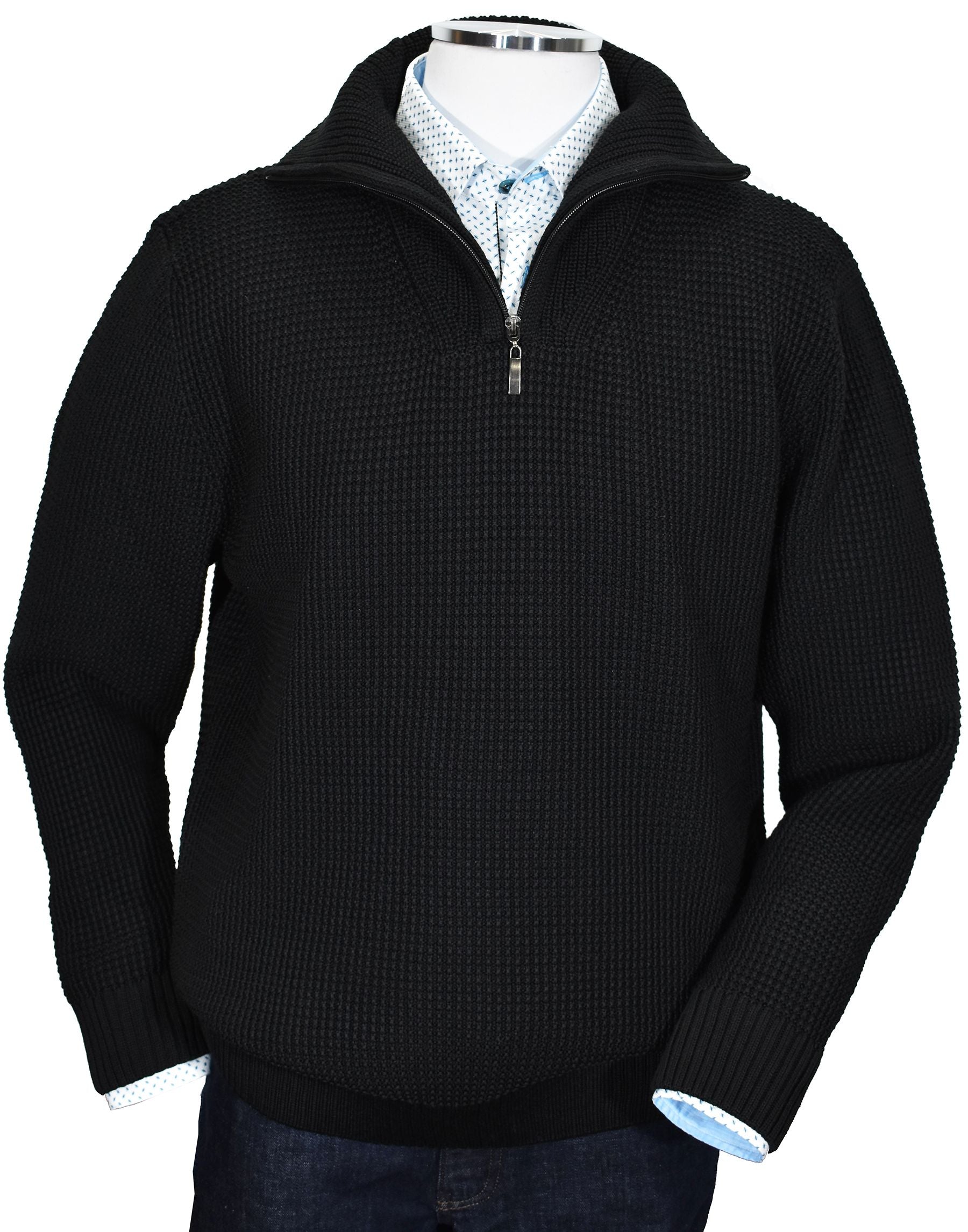 The interesting grid stitch is a new twist for the fisherman style knit. While it gives the same look and feel as a traditional fisherman knit, the stitching pattern creates a cool contemporary style. Moderate weight, soft Italian merino wool blend, with a full zip mock turtle collar for versatility and style. Wide rib stitching effect for the cuffs and waist band. Classic fit. By Marcello Sport