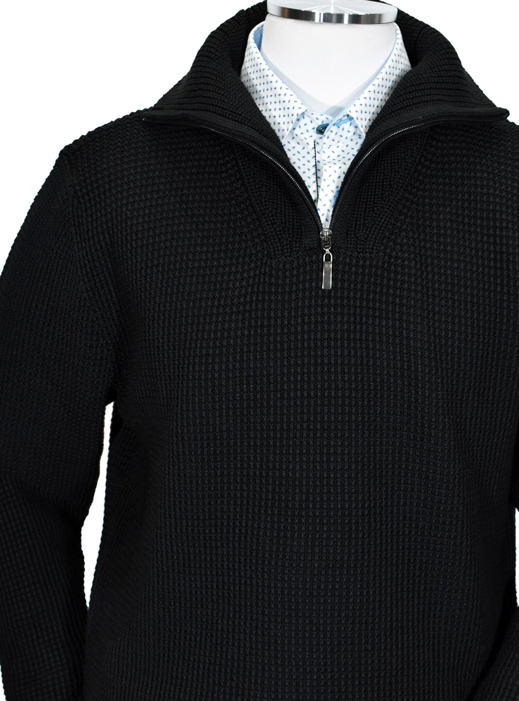 The interesting grid stitch is a new twist for the fisherman style knit. While it gives the same look and feel as a traditional fisherman knit, the stitching pattern creates a cool contemporary style. Moderate weight, soft Italian merino wool blend, with a full zip mock turtle collar for versatility and style. Wide rib stitching effect for the cuffs and waist band. Classic fit. By Marcello Sport