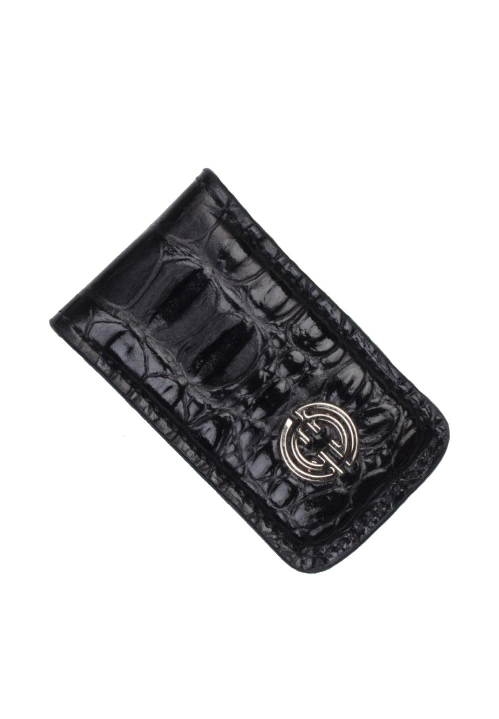 Keep it simple, yet cool, with this soft leather stamped hornback croc pattern.  Black shaded croc stamp. Genuine leather over metal clamp. Perfect to travel light and keep your valuables in your front pocket.  By Marcello Sport