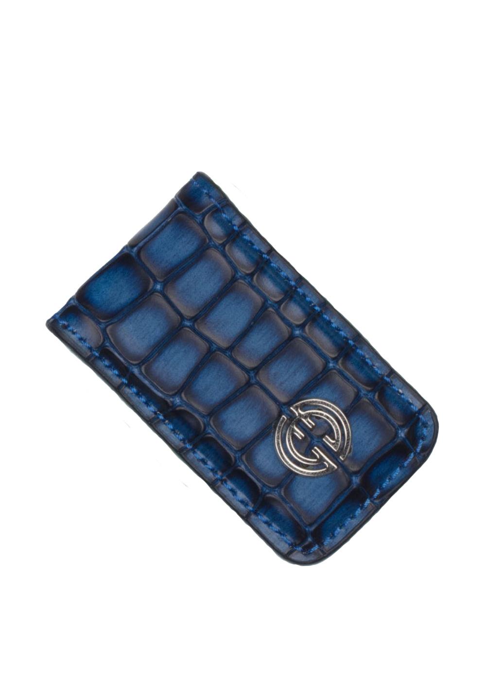 Keep it simple, yet cool, with this soft leather stamped gator pattern. Classic indigo gator print on soft leather. Genuine leather over metal clamp. Perfect to travel light and keep your valuables in your front pocket. By Marcello Sport