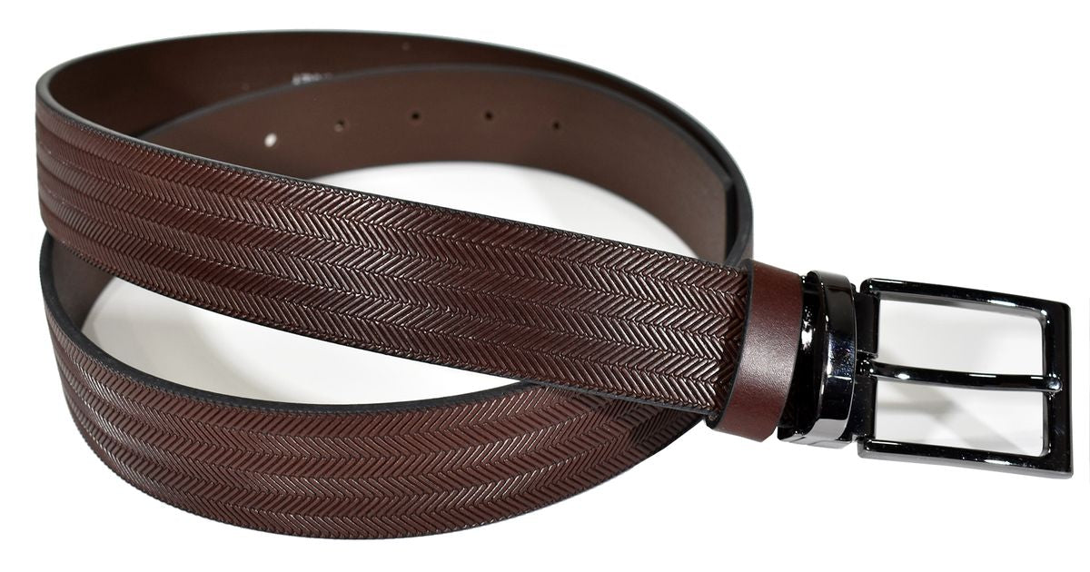 The always rich and elegant herringbone pattern is taken to another level when stamped on classic, soft leather to create a timeless look.  Brushed nickel buckle.  Sizes 32 to 44  Color is brown.