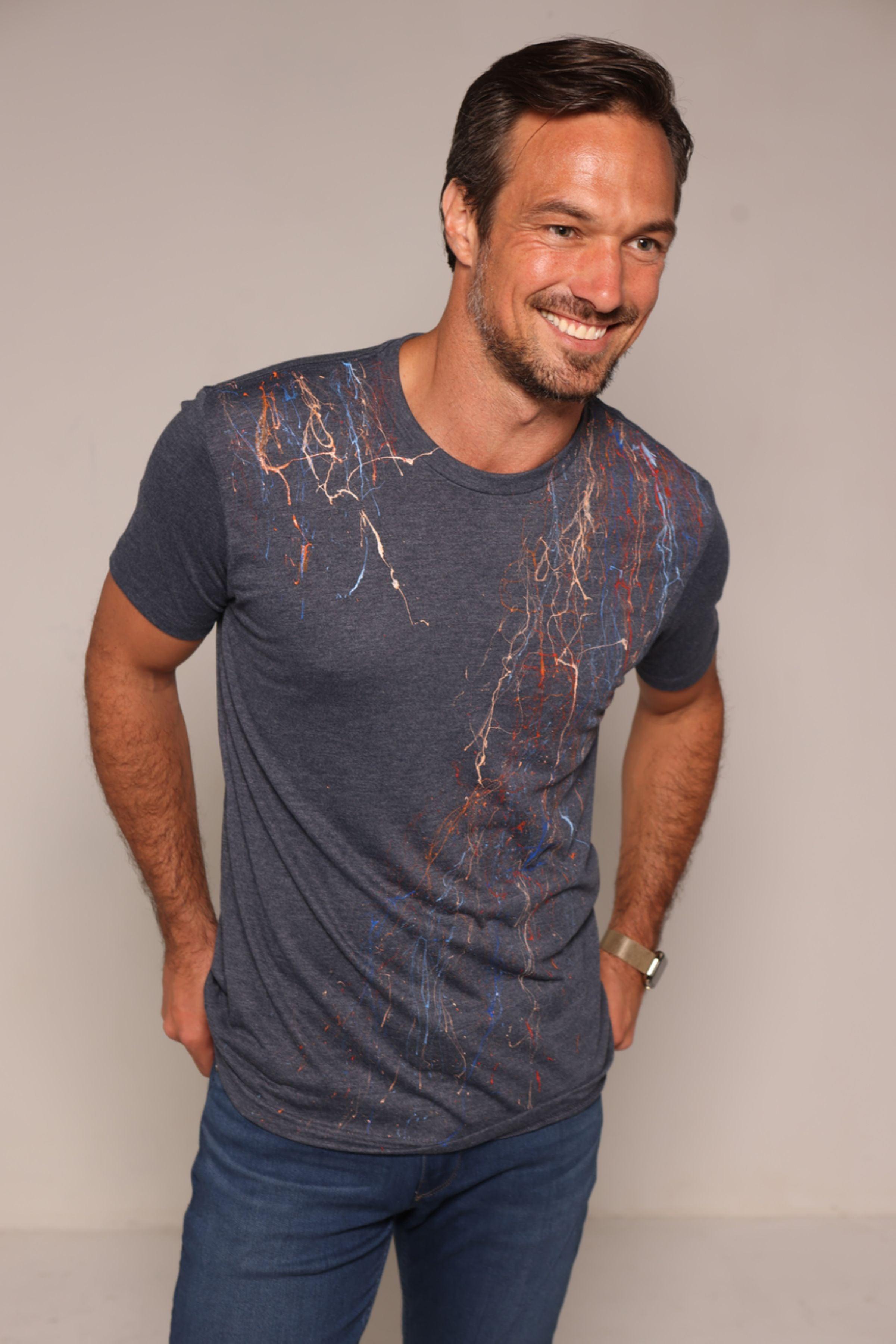 Tee shirts are not just tee shirts anymore. Our hand painted tees are individually painted by artists making each one a unique piece of art and making them stand out from other tee shirts in quality and style.  Elevate your casual fashion lifestyle with this hand painted indigo colored tee.