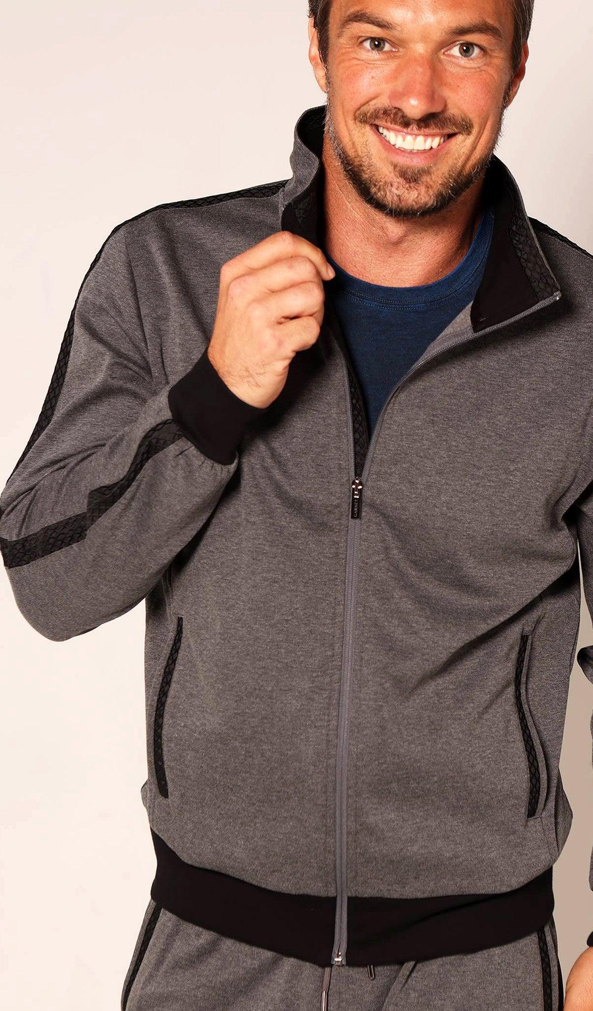 Imagine your look in this contemporary styled leisure set from Marcello Sport. Clean updated details give way to the tread textured accent detailing.