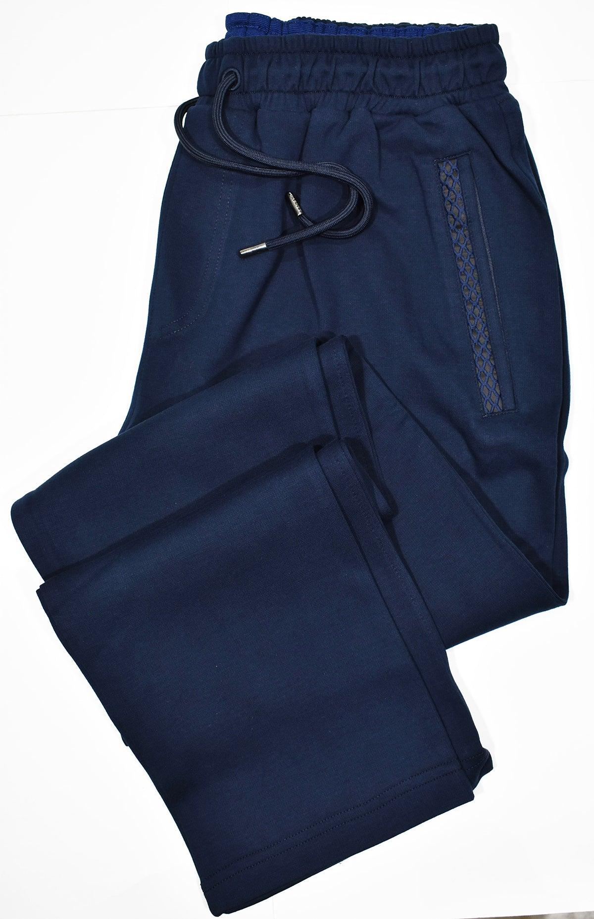 Imagine your look in this contemporary styled leisure set from Marcello Sport. Clean updated details give way to the tread textured accent detailing.