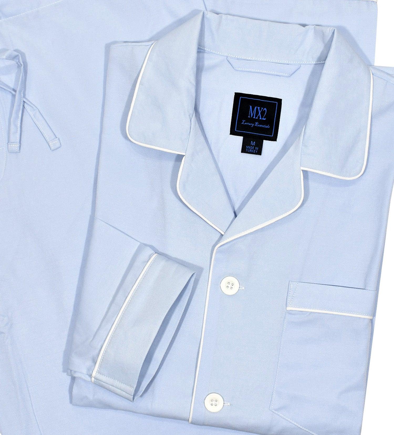 Our exclusive men's pajamas are made with extra fine cotton that is soft to the touch.  The result is a comfortable pajama that enhances your around the house lifestyle.  Soft cotton woven fabric. Traditional tonal herringbone pattern for a rich look. Soft blue coloration.