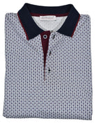 A classic white polo with a crisp printed gray and black medallion pattern creates a unique fashion look coupled with a casual or dress image.  Finely knitted pique cotton fabric.  Matched collar, contrast fabric under the buttons and hand selected buttons.  Classic fit.