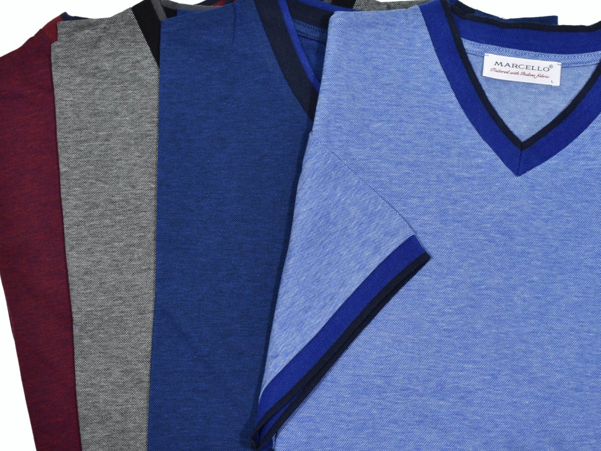 Cotton rich, royal oxford fabric always feels good and looks perfect. The v neck model is contemporary in nature with a high v silhouette and two color contrast fabric. Contrast edge fabric adds a sporty image to a classic v neck model. Classic fit. Colors: Wine, Charcoal Indigo, Sky