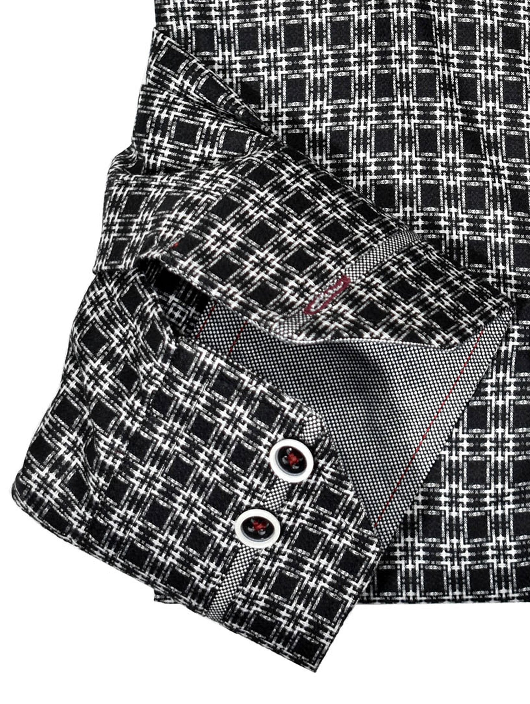 Unica Milano Bricket Medium check pattern is enhanced with a neat inset pattern. Striking black background with multi color dot pattern. Medium spread collar and custom matched buttons. Classic Shaped fit.