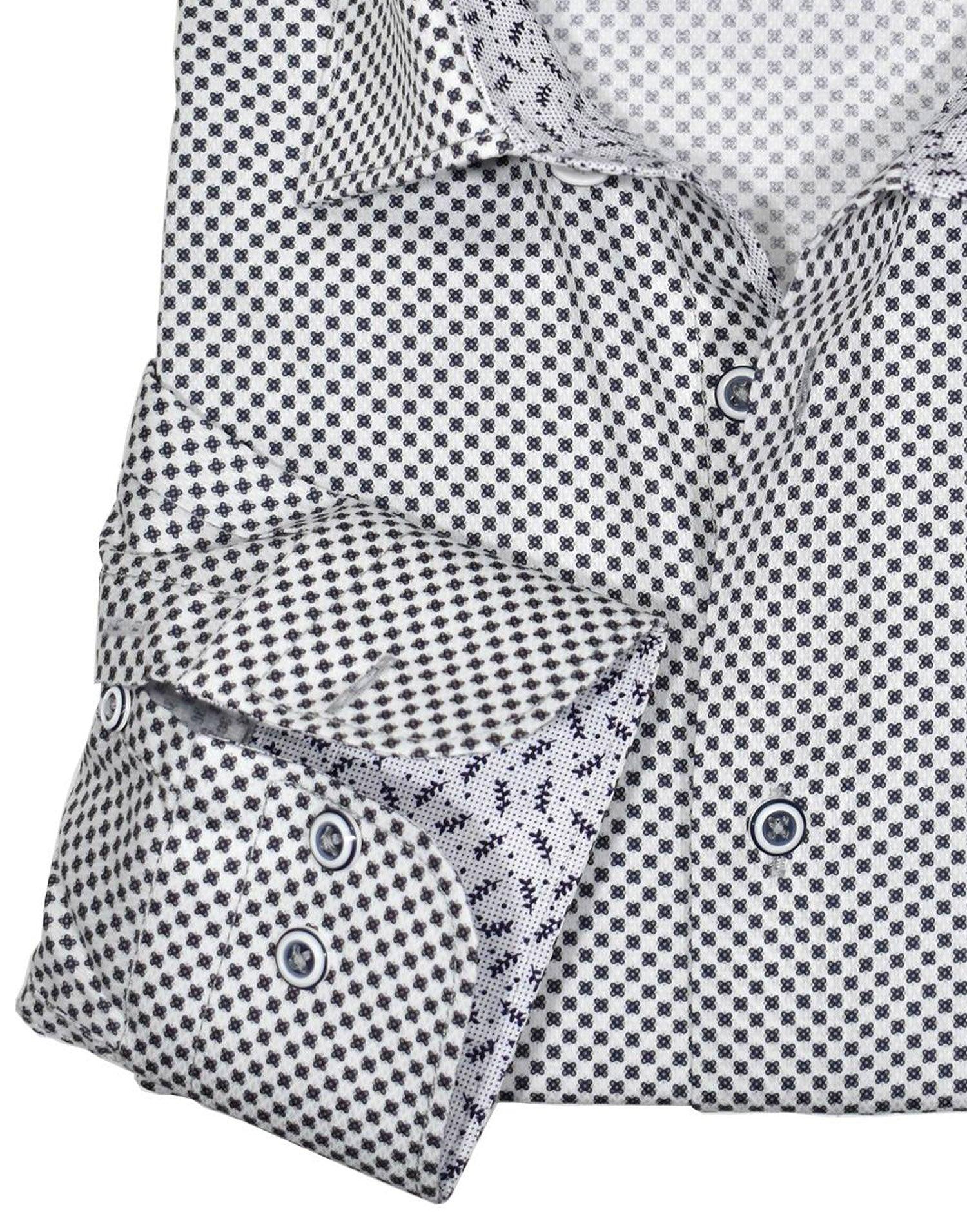 A crisp white shirt is a staple of any wardrobe. Add a wht/blk medallion pattern and contrast stitching for a unique fashion statement. Exclusive soft cotton fabric. Sophisticated tonal paisley pattern. Contrast fashion stitch work. Custom selected buttons. 2 button signature cuffs. Slim fit. Approximately 5'8" 150lbs is the perfect MD.