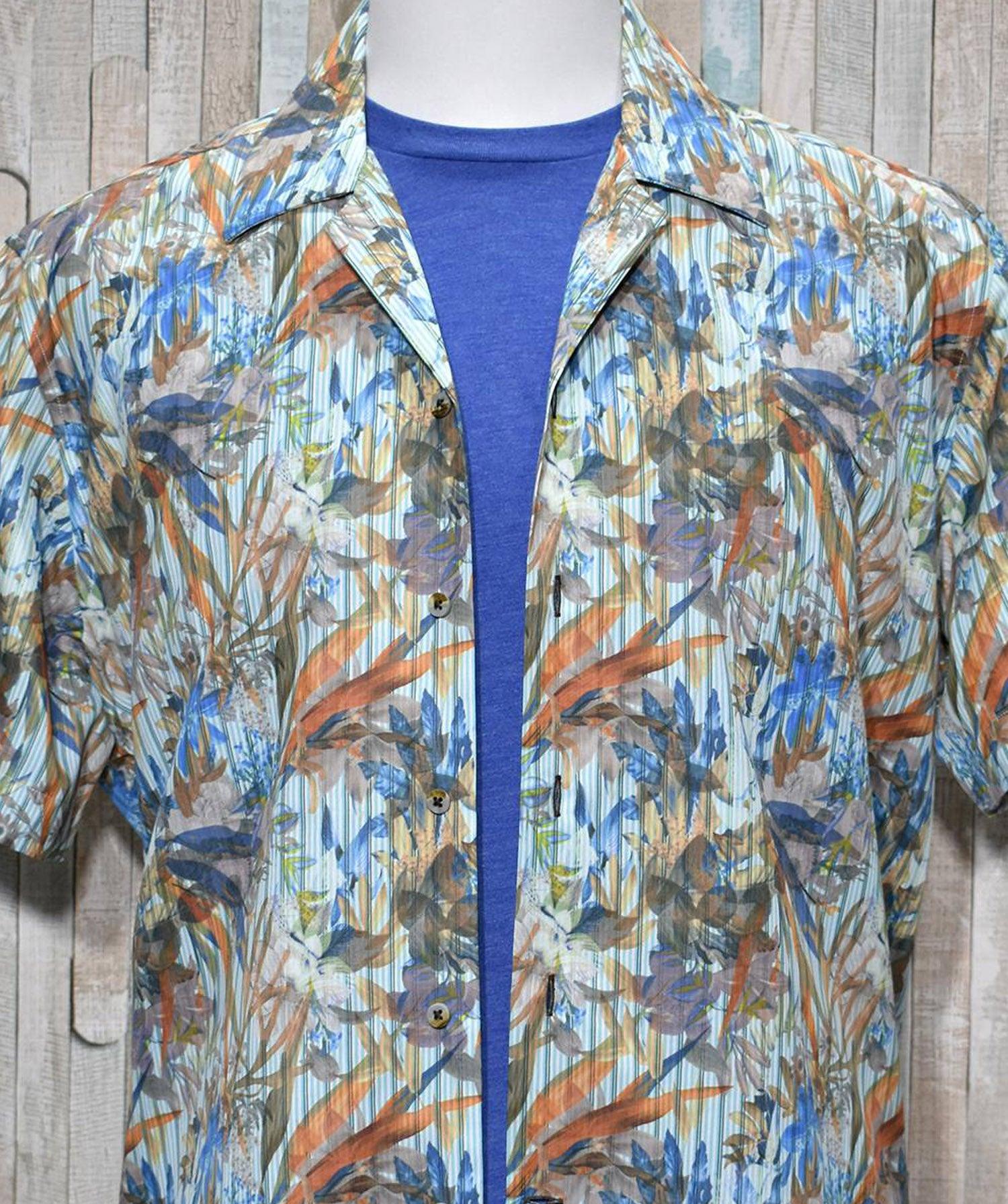 Choose this lightweight cotton and viscose shirt for your casual lifestyle.  Whether layered or alone, it is a great choice to enhance your fashion style.  Soft cotton and viscose fabric. Square bottom style with side slits. Camp model collar adds casual style. Modern fit for a slim to medium build.  Print shirt by Marcello Sport.