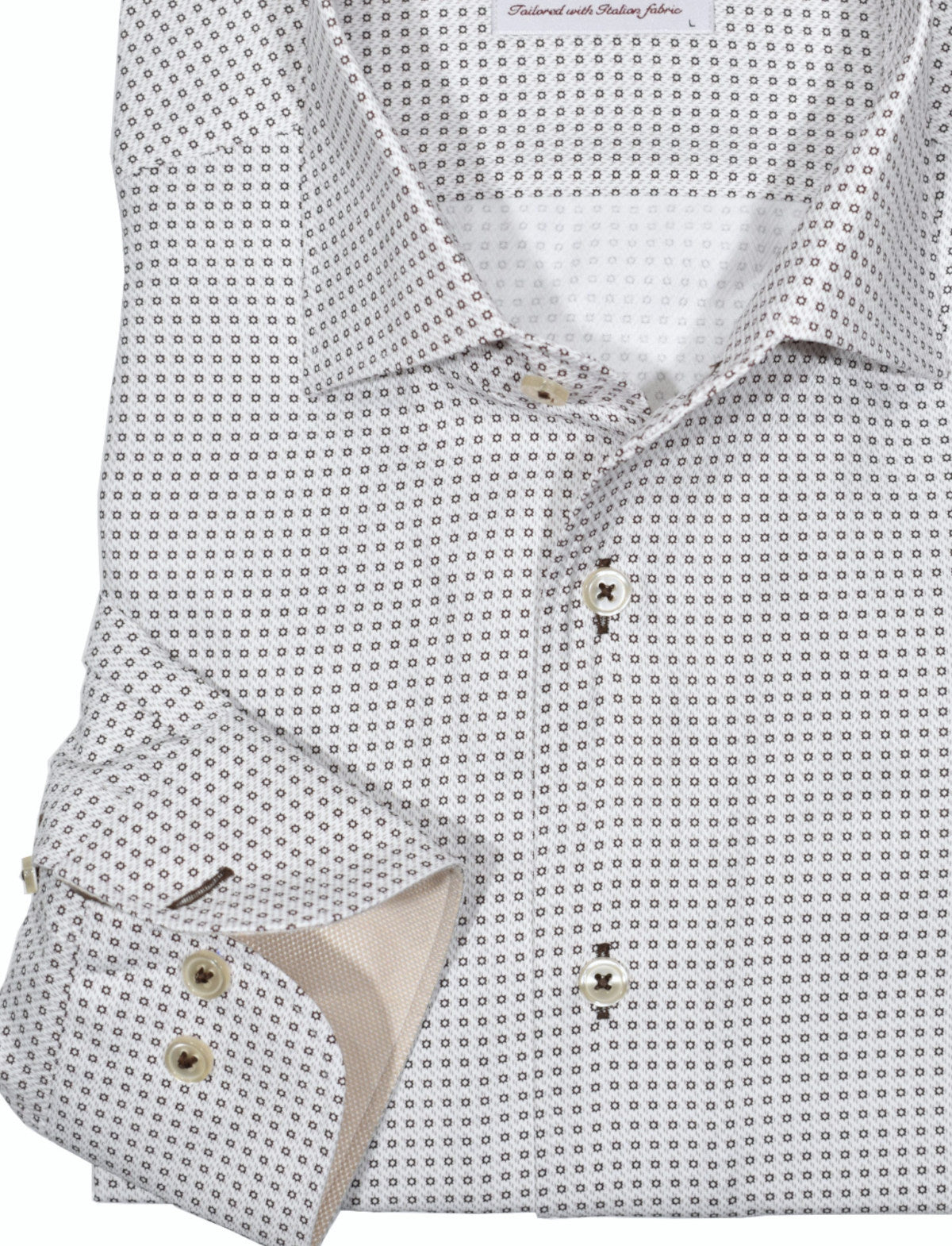 The ultimate, Marcello one piece roll collar, where the collar stands perfectly. The cotton microfiber fabric sports a rich herringbone pattern that feels great to the touch and the subtle print in soft tan creates an updated traditional pattern with style. Details include custom selected buttons, fashion cuff trim fabric and fine stitching. Excellent choice to pair with bottoms in most colors. Classic shaped fit.
