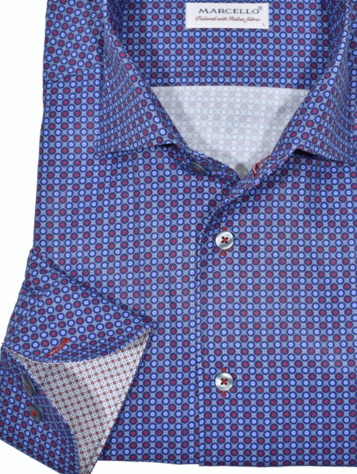 The ultimate, Marcello one piece roll collar, where the collar stands perfectly and the ultra cotton fabric feels incredible. The tight circle print pattern in welcoming blue shades with fine red accents is an excellent choice to pair with any color denim jeans. Complimentary under cuff trim fabric, matched buttons and matched stitching. Classic shaped fit.