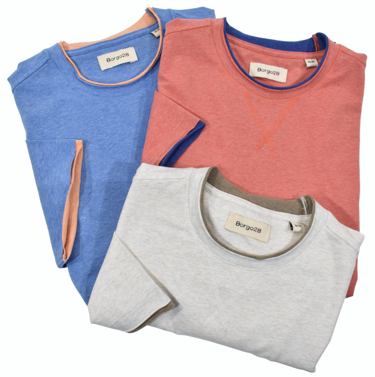 Ultra soft washed cotton with a touch of spandex for stretch comfort.  All the edges are finished with contrast color fabric to create a raw looking edge and trendy hip look.  Tonal sweatshirt enhanced stitching at the front neckline.  Classic fit.   Colors: Blue, Red, Wheat