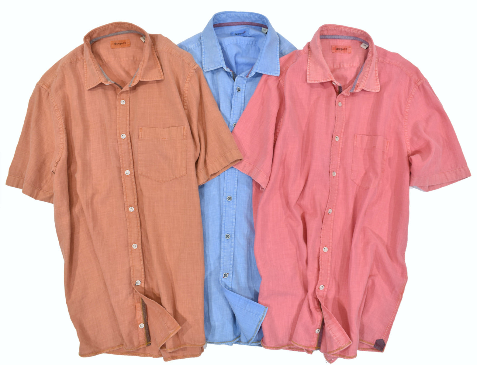 Soft washed for a enjoyable, soft hand feeling and slight distressed look to create a casual cool look. The cotton fabric has a fine linen type weave to add texture.  Soft collar, chest pocket and subtle contrast detailing, along with a thick custom stitch along the bottom.  Classic fit.   Colors: Mango, Rose, Sky