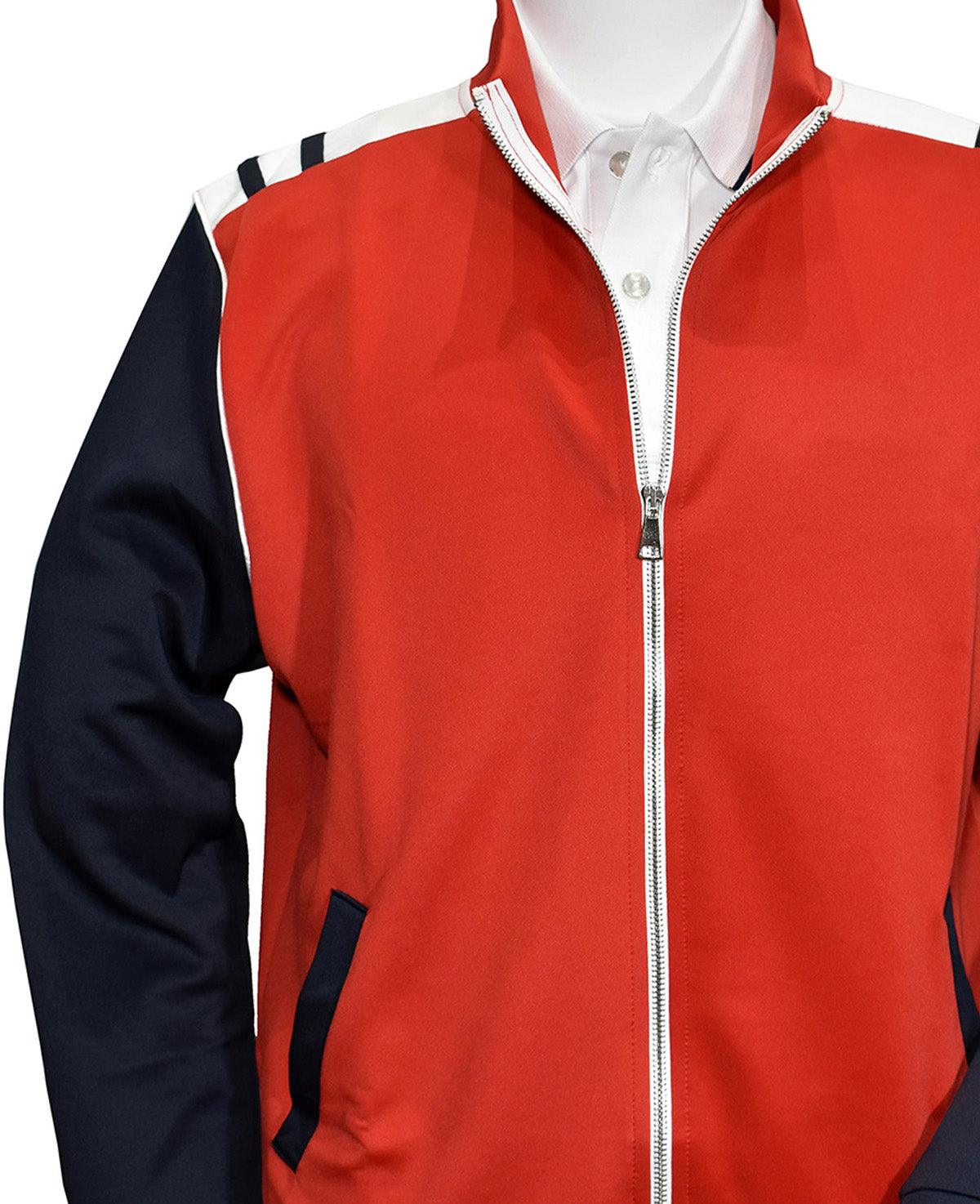 Poly microfiber fabric for comfort and style. Accent red and white trim creates a flair sure to get noticed. Classic jacket style with side slash pockets and full zip, great for layering. Pant features a stretch waist band, tie front and classic pockets. Pants feature an open bottom. Made in Italy.