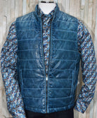 The perfect style for those cool days or nights that require a little extra warmth. The soft, medium weight leather is stitched to add style and an updated cool look. Imported, modern fit and a medium weight. Zip Leather Vest by Marcello Sport.