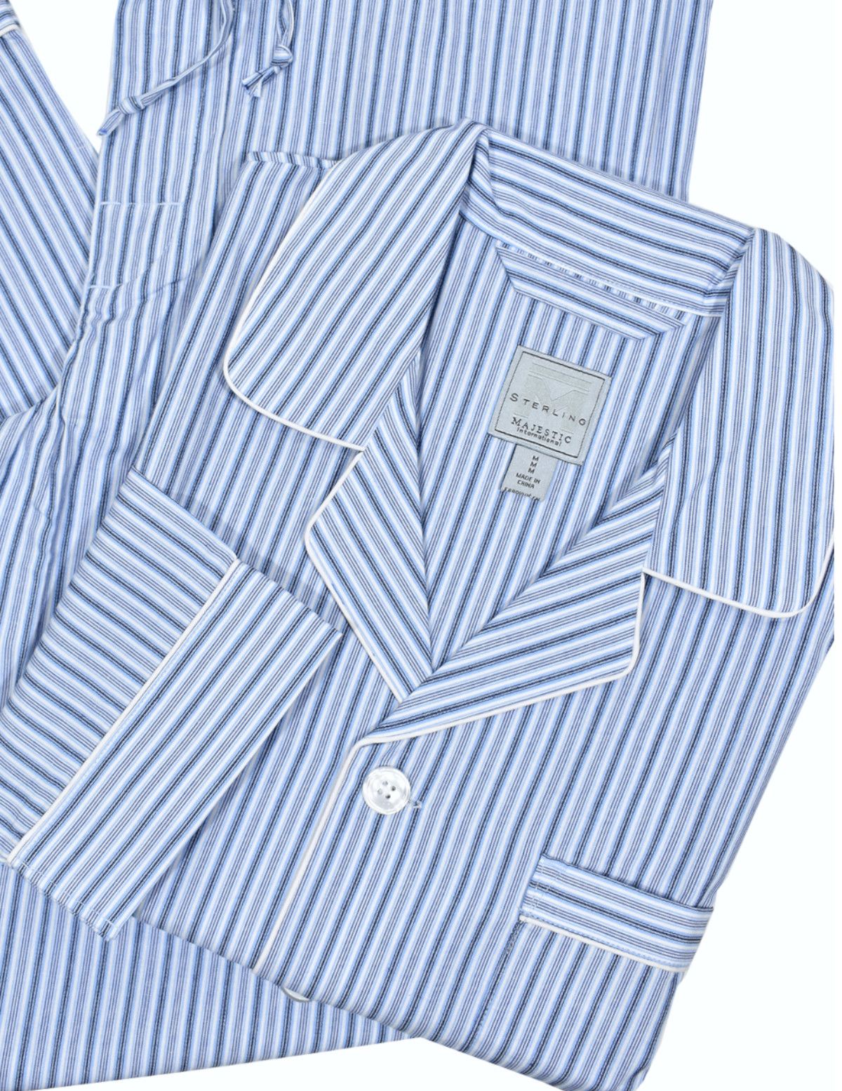 Classic soft cotton pajama in a dark navy ground with small white paisley pattern to add style to a traditional look.  Full button closure top, chest pocket and edge piping.   Draw string pant with button fly and stretch waist.  Classic fit.