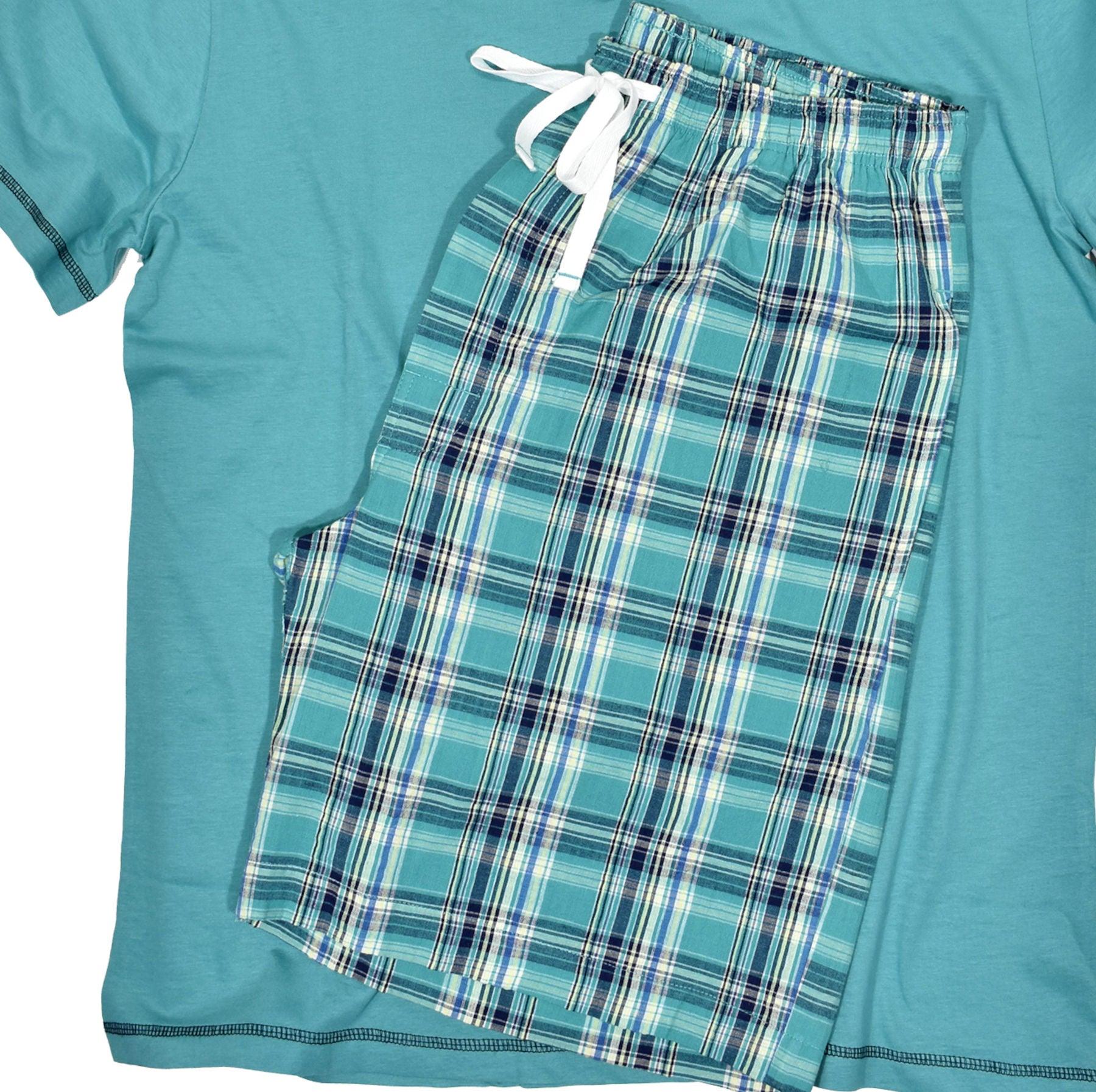 Your leisure lifestyle is enhanced with this coordinated set of a seersucker plaid short and pima cotton lux tee.  Color coordinated to work perfectly together and a great gift idea.  Available in Teal, as pictured, or Royal.  Cotton textured seersucker type short. Pima cotton lux tee with accent stitch detailing. Classic short pockets, stretch waist band and classic tie front. Classic fit.