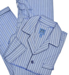 Button front top with chest pocket and open sleeve.  Draw string pant with stretch waist and button fly enclosure..  Classic fit.