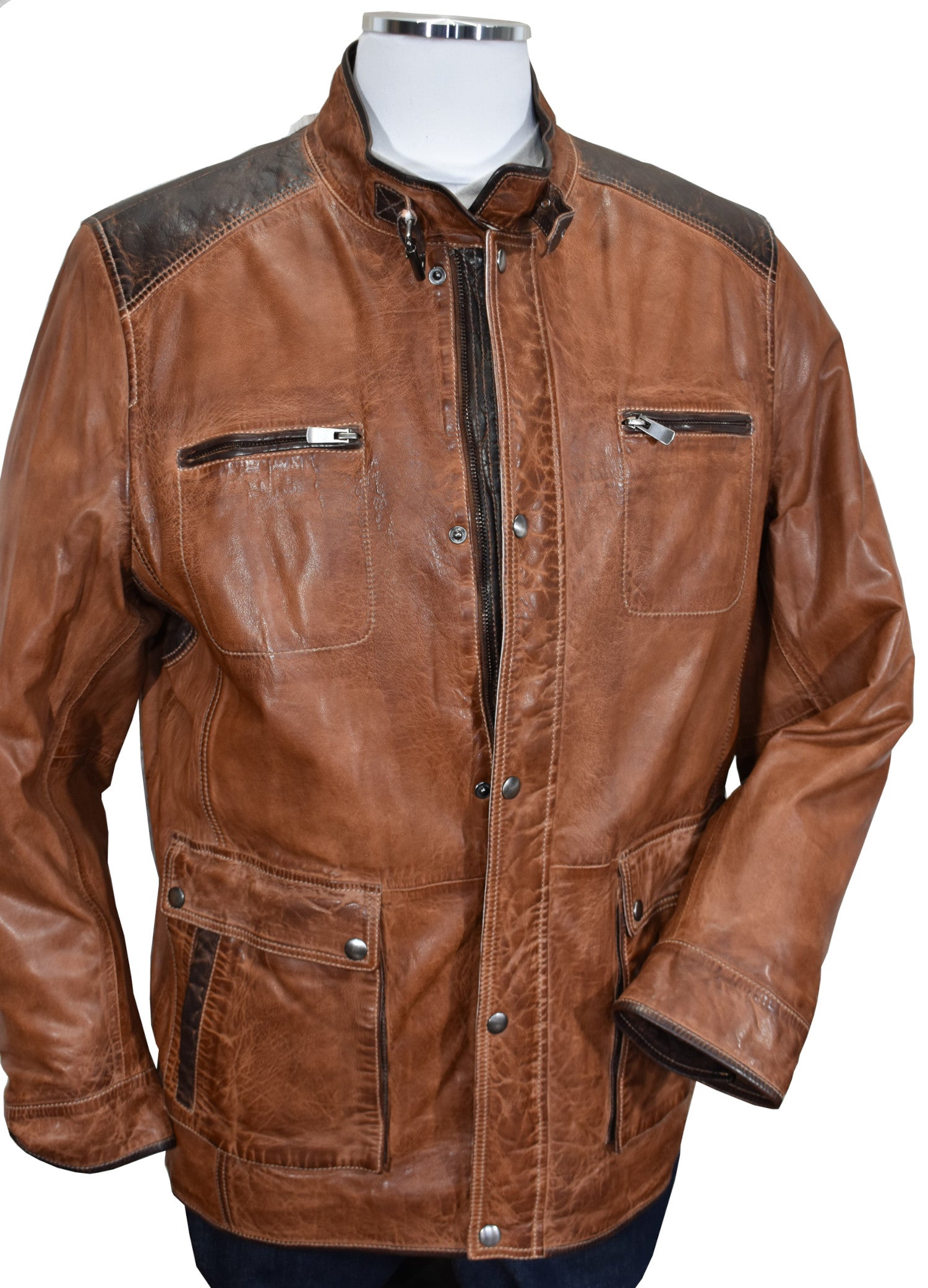 Marcello Sport soft washed and slightly distressed nappa leather coat in a rich cognac color with chocolate leather accents.  The cool model features enhanced and multiple stitch detailing and both zipper and button front enclosure. Side waist flap pockets and classic inside chest pockets.  Biker model is a straight cut with a length just below the hips.  Classic fit.