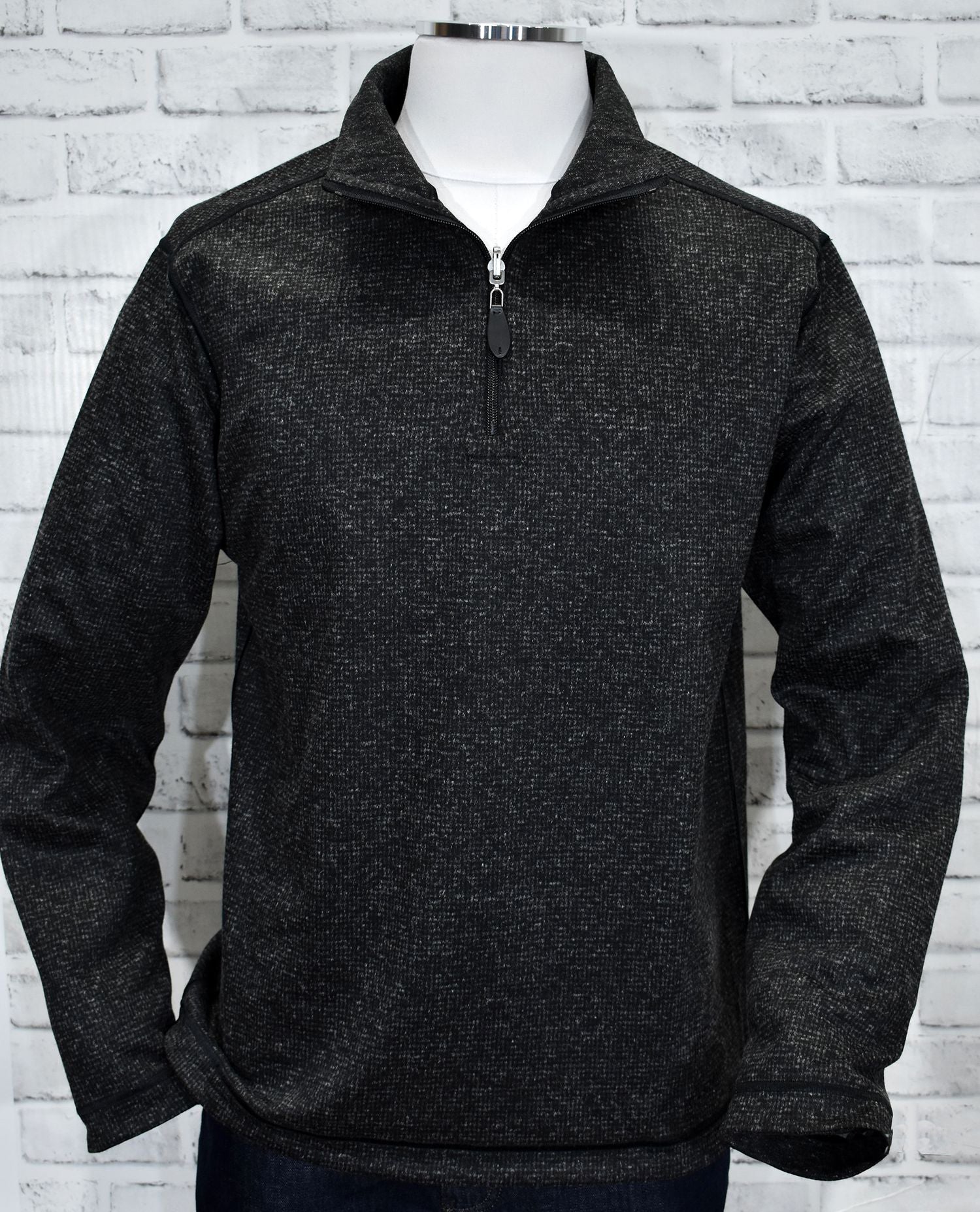 Nico brushed "reversible" houndstooth is the ultimate travel piece.  The polynosic microfiber fabric is soft feeling and performs well no matter how you wear it or crumple it.   The welted stitch detailing around the arm hole, along the shoulder and neck add a sporty image.